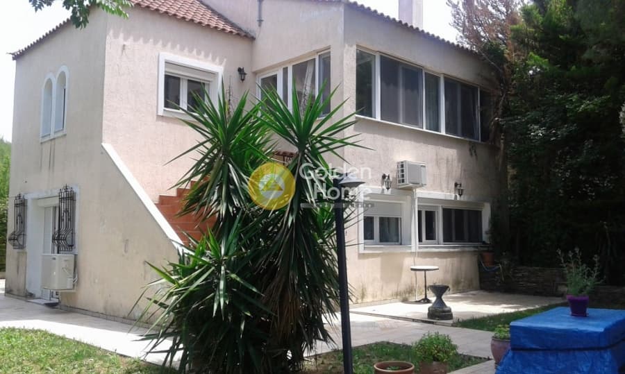 House in Kapitenia, Agios Stefanos — Photo 1 of 44