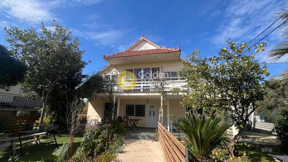 House in Lamprika, Koropi — Photo 1 of 17