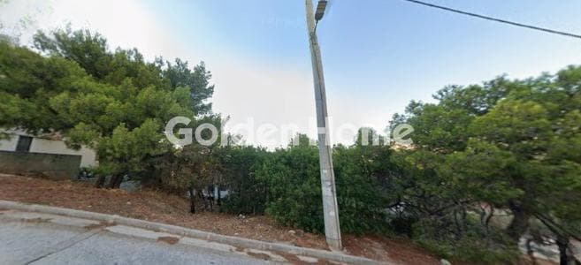 Οικόπεδο στην Σαρωνίδα, Σαρωνίδα