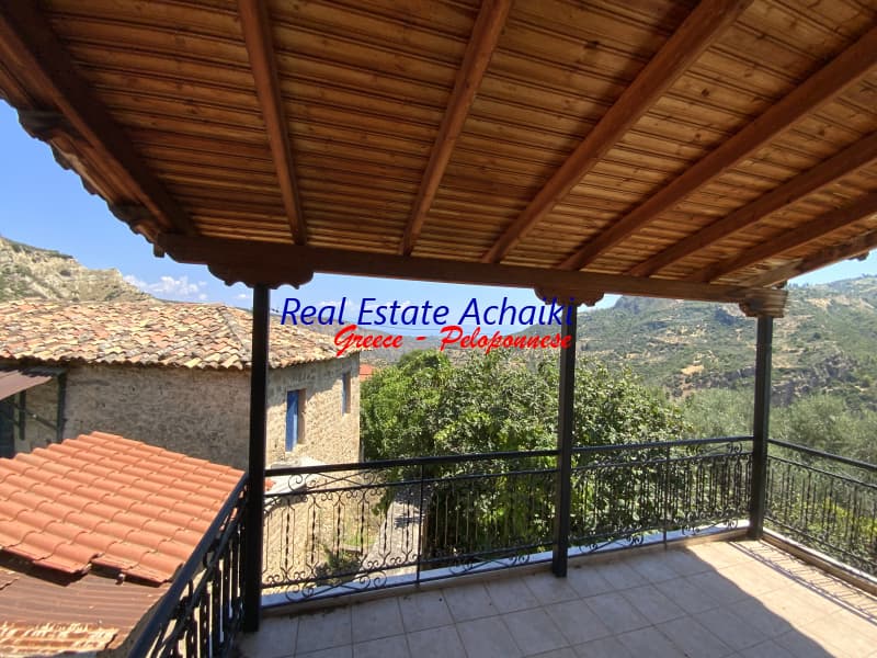 House in Voutsimos, Akrata — Photo 1 of 25