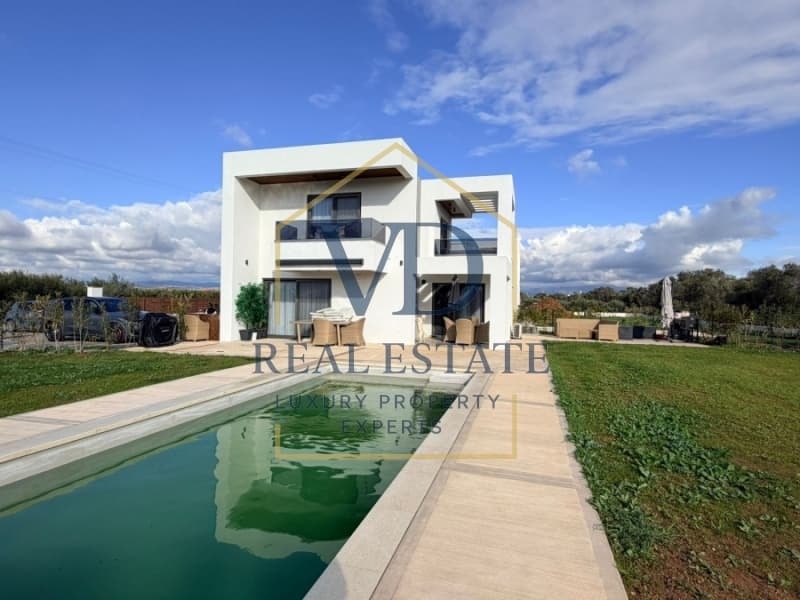 House in Paralia Dionisiou, Moudania — Photo 1 of 16