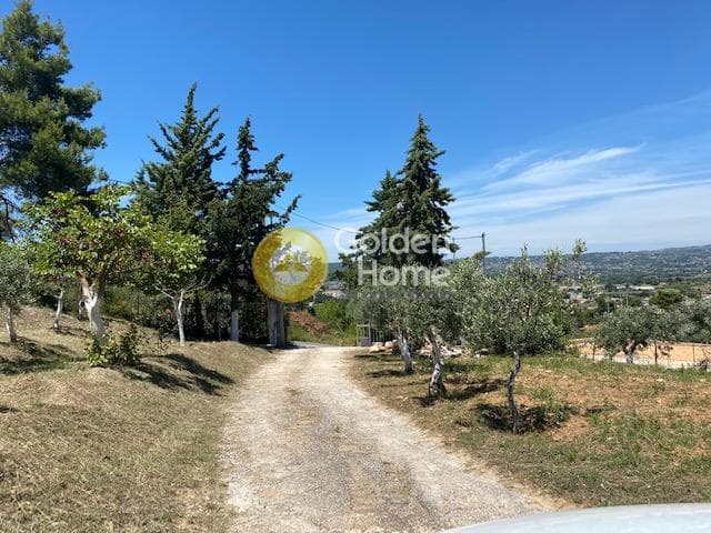 House in Nimfon, Agios Stefanos — Photo 1 of 23